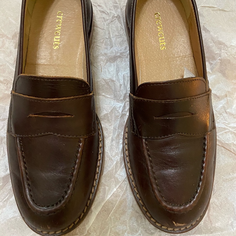 Cigar brown boys leather penny loafers.